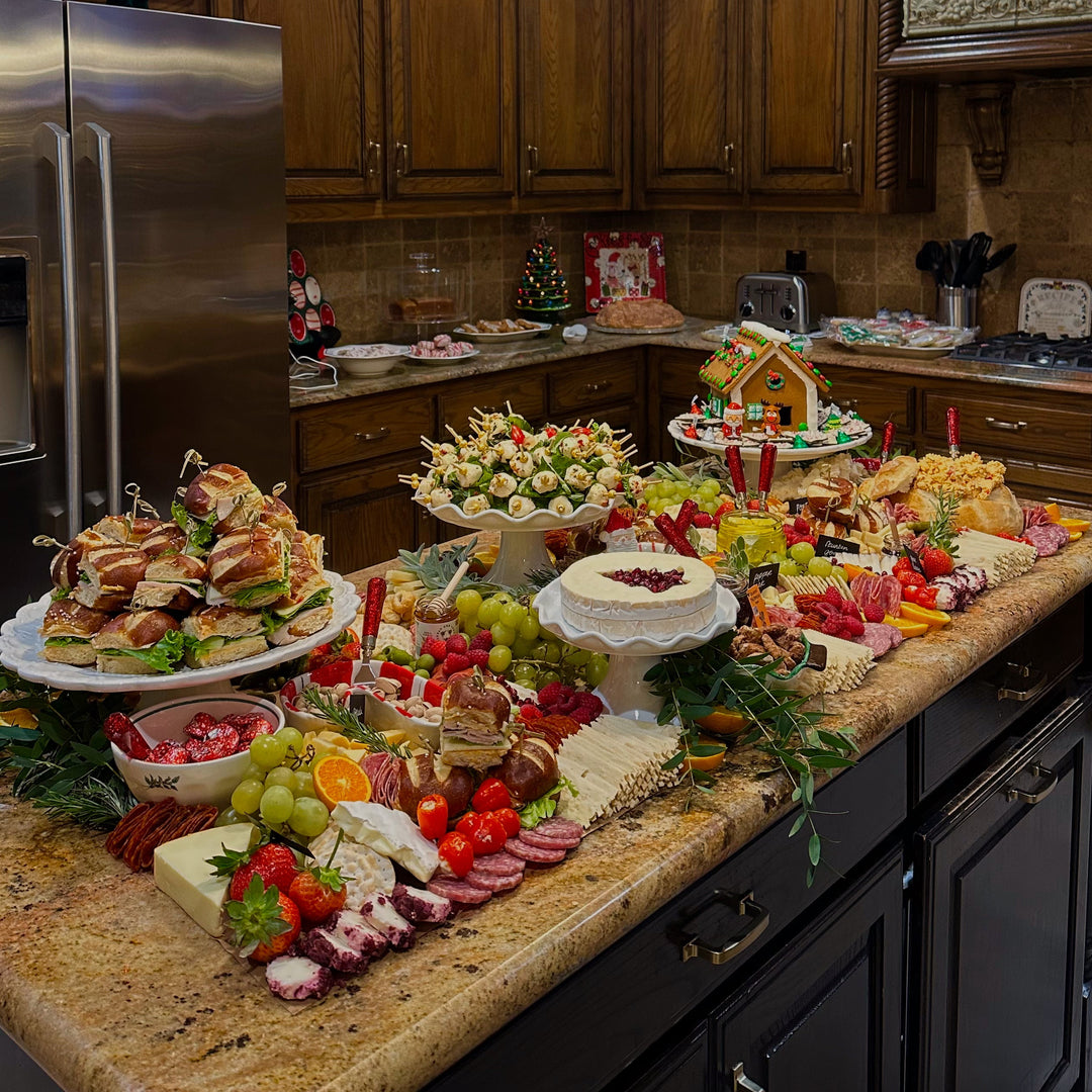 4 FT grazing table, holiday themed with caprese skewers, turkey pretzel sliders. Customer provided own props 
